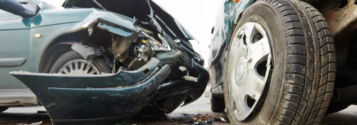 Car accident damage representing whiplash injury treatment